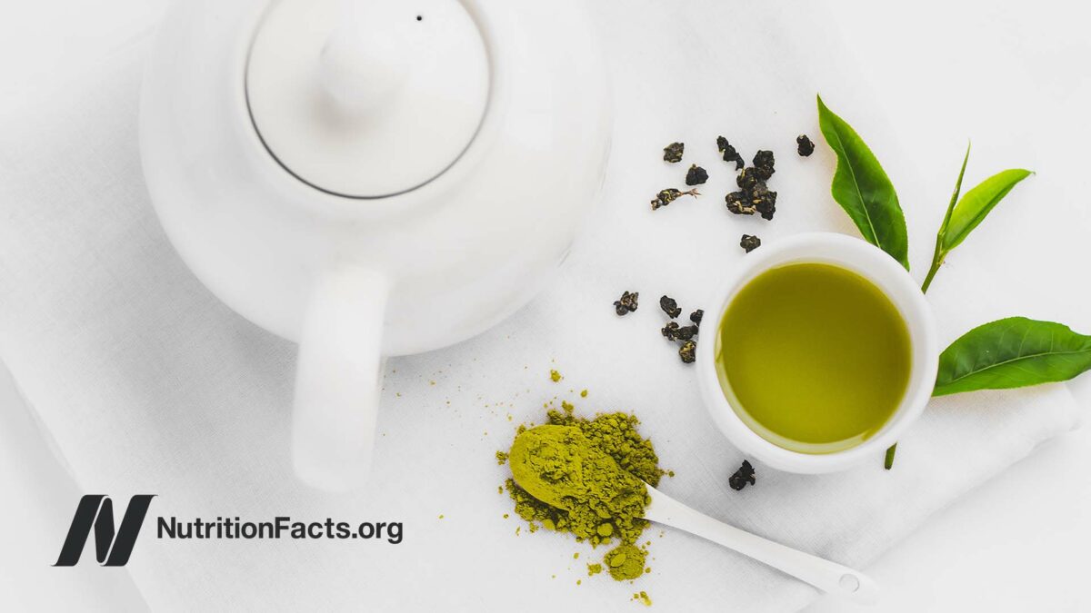 green tea and white teapot