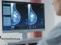 doctor looking at mammogram image on computer