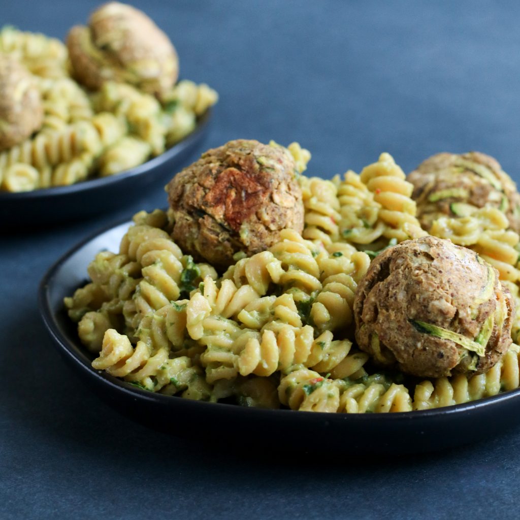 Gemelli with Zucchini Meatballs on slate background