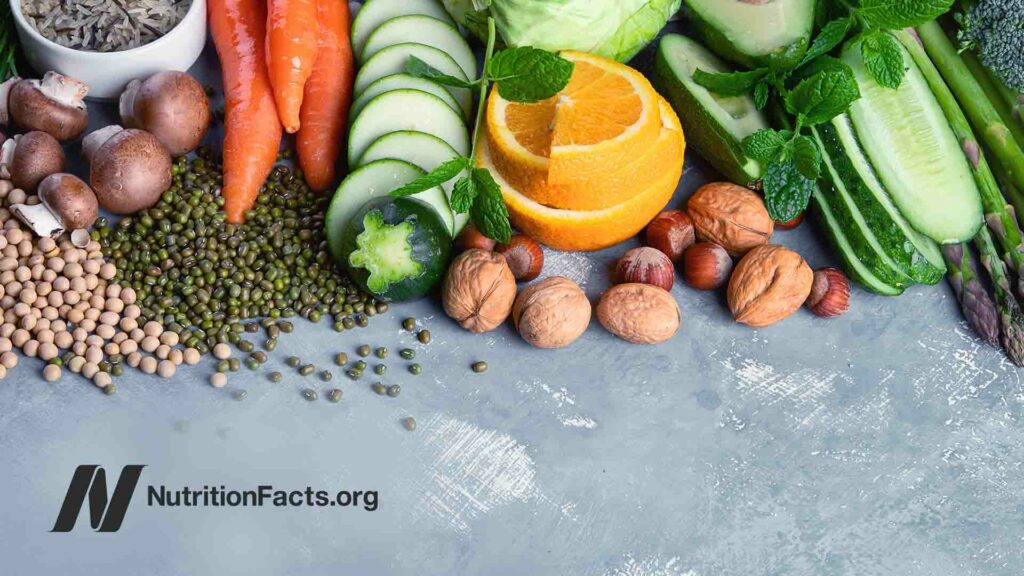 Fresh plant based diet ingredients on light countertop