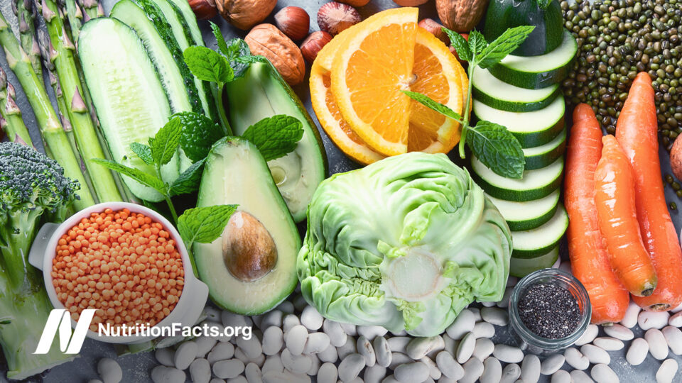 a pile of fresh foods on a grey counter