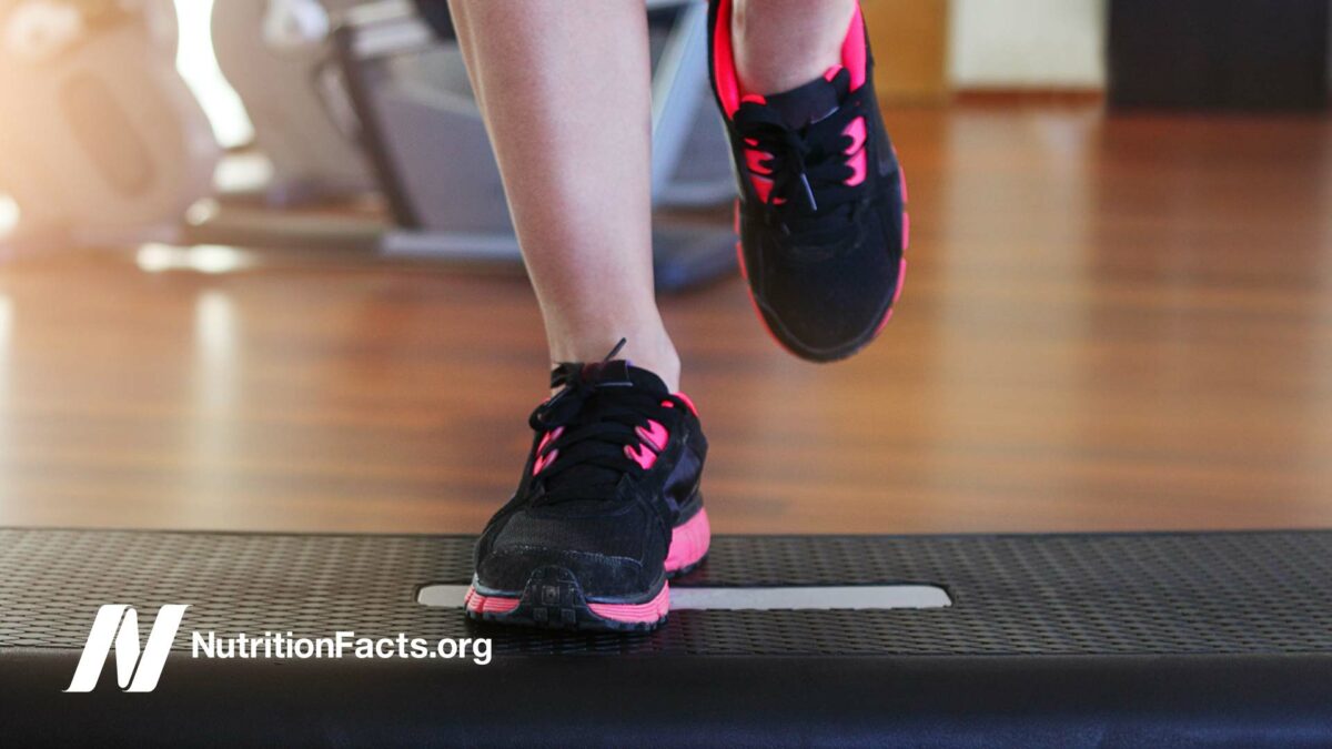 woman participating in step exercise