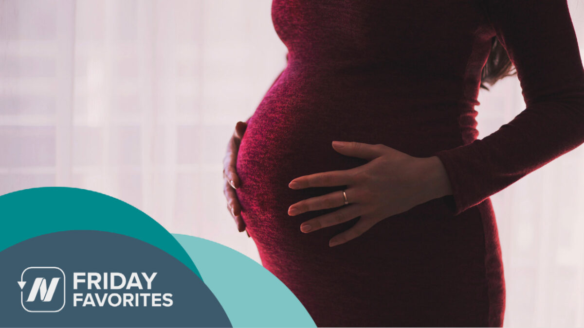 pregnant woman in a red dress