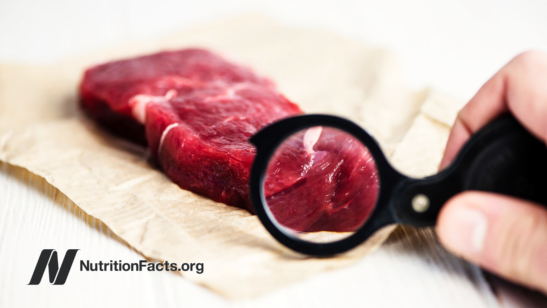 raw beef with magnifying glass