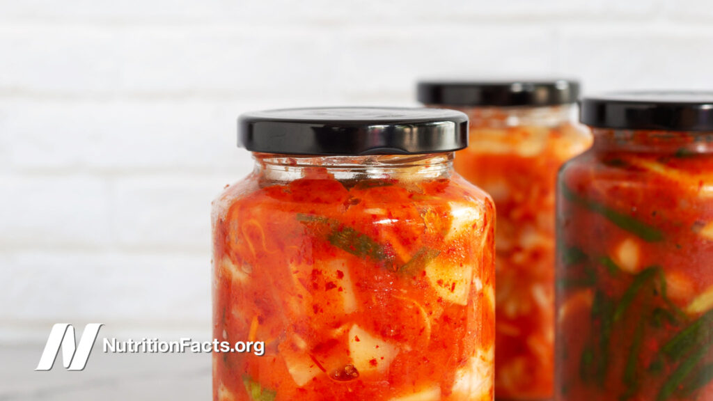 homemade kimchi in jars in a unexceptionable white kitchen