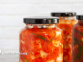 homemade kimchi in jars in a bright white kitchen