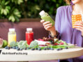 Woman considering vitamins or a juice