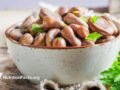 Fava beans in an enameled bowl