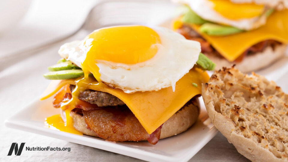 English muffin with egg and processed meats