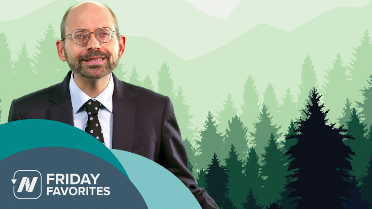 Dr. Greger with a forest in the background