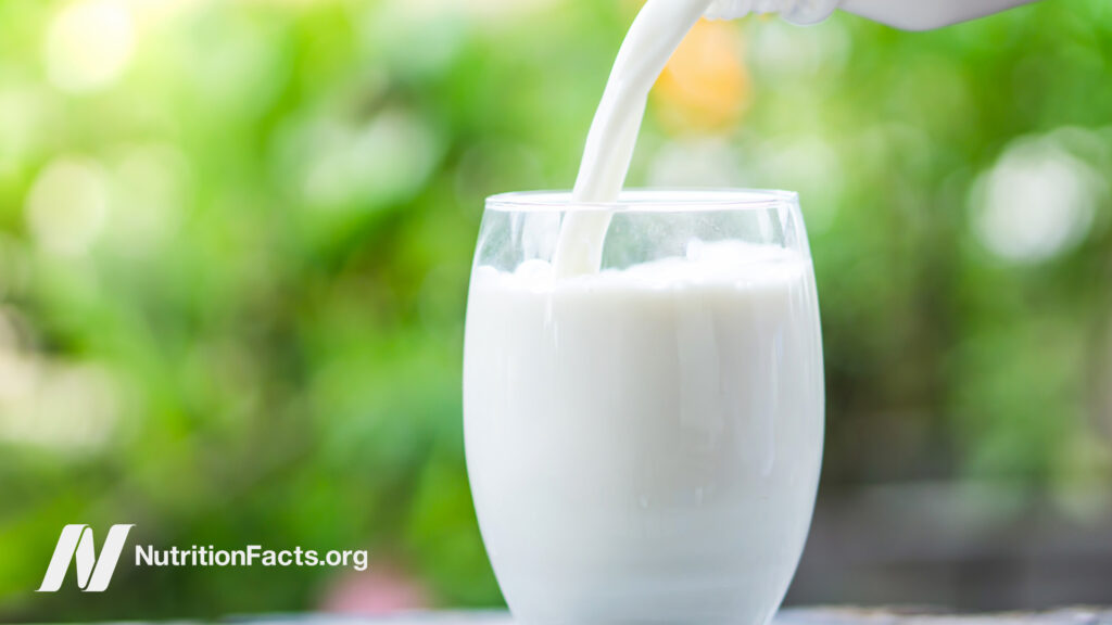 Milk is poured into a glass