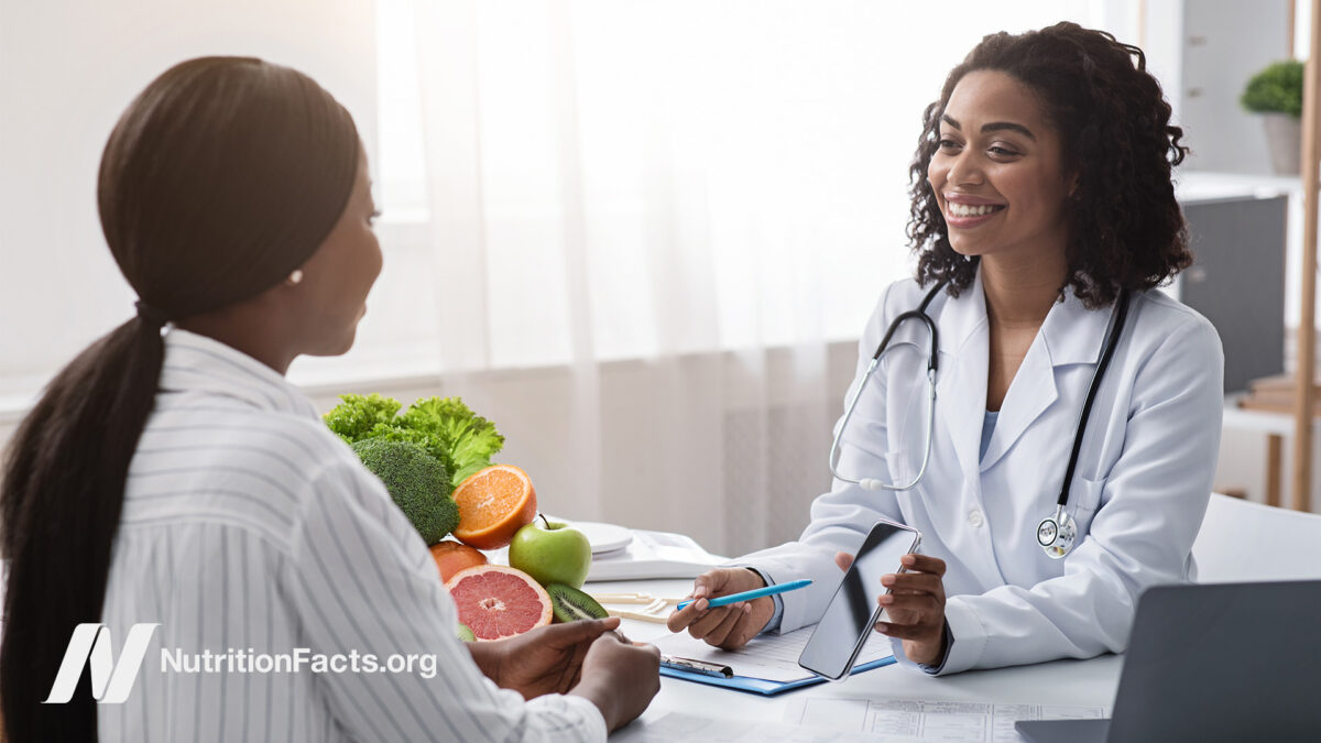 A medical professional advising their patient on nutrition