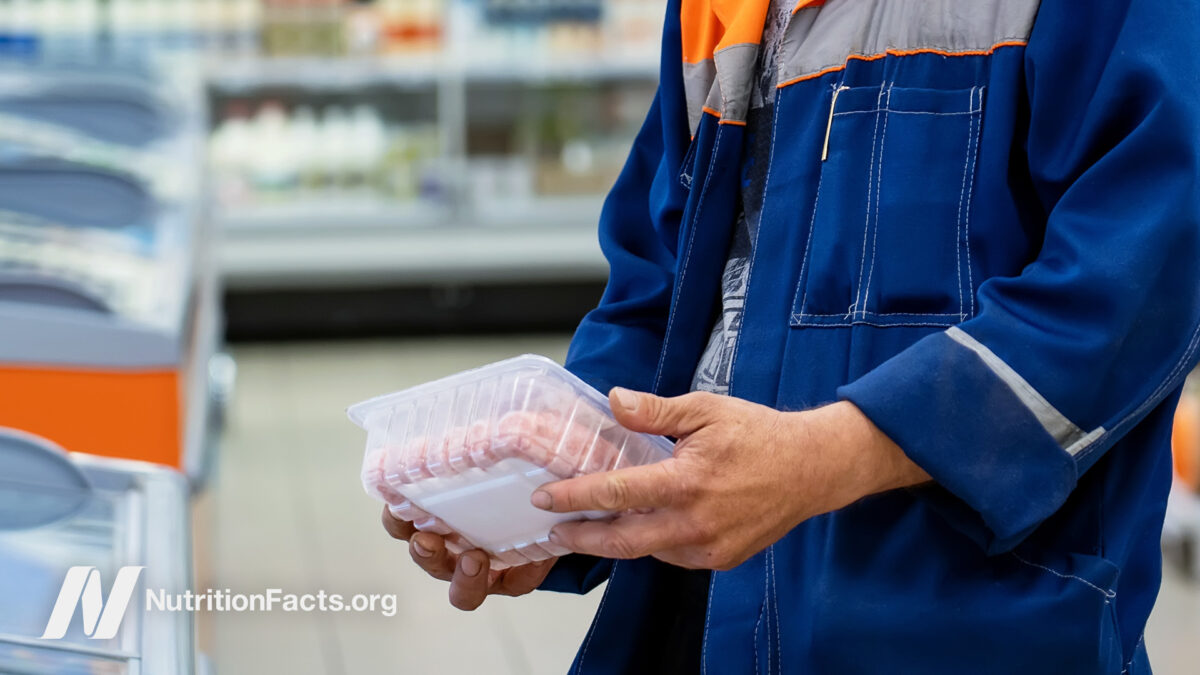 Customer considering purchasing meat at the store