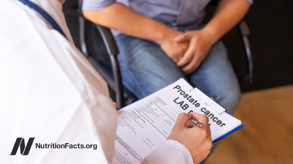 Doctor and patient reviewing prostate test lab results