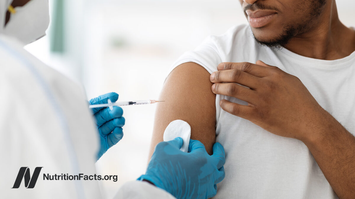 Patient receiving a vaccination from medical provider