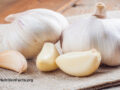 Garlic bulbs and cloves on a cloth