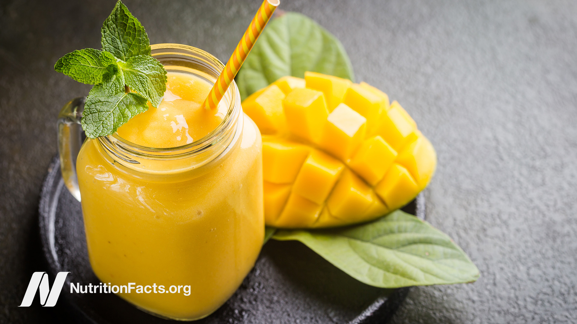 Mango smoothie in a glass jar