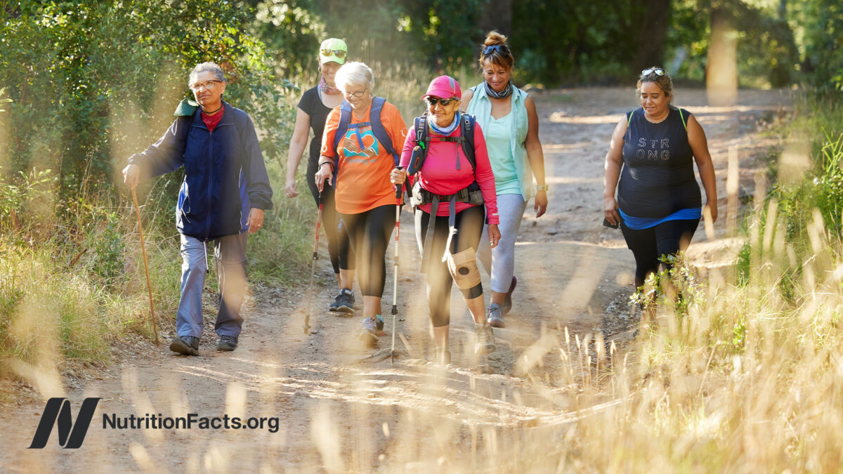 Group of adults of various ages walking together outdoors