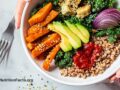 A bowl of healthy plant-based foods being presented