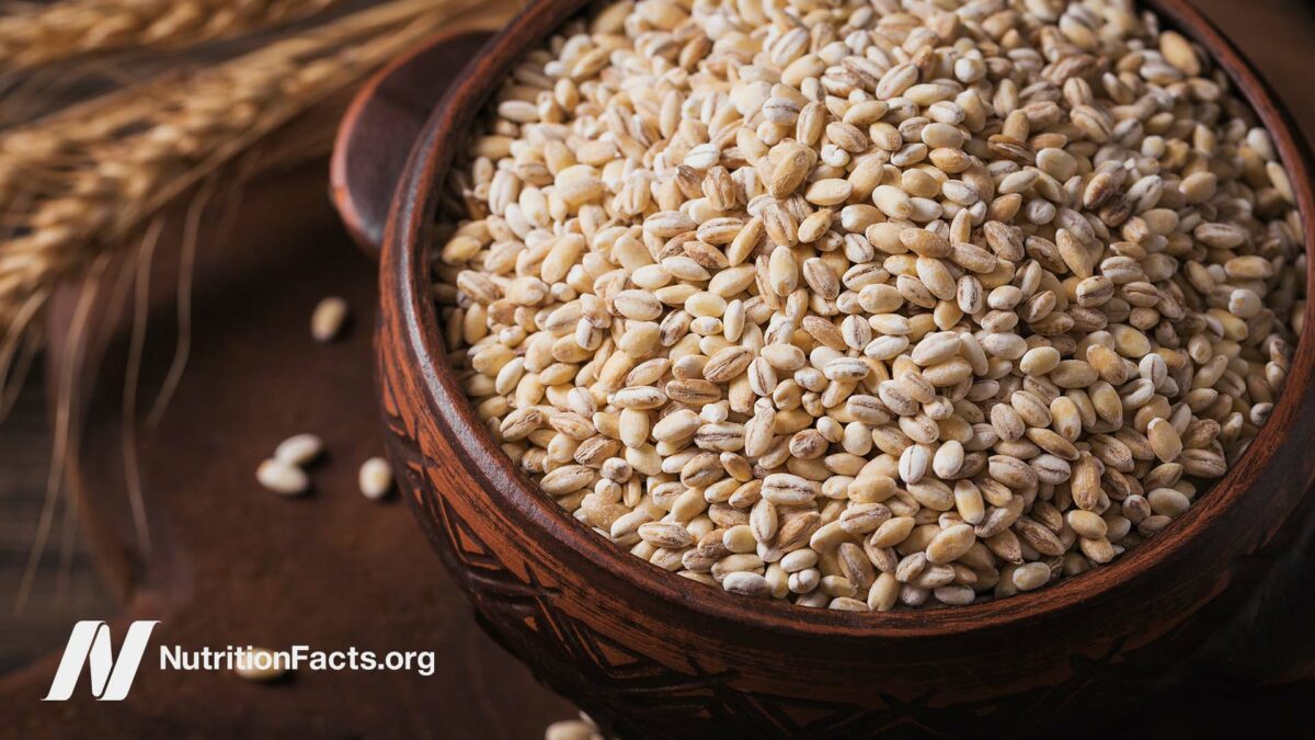 A brown bowl of intact grains