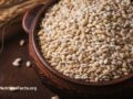 A brown bowl of intact grains