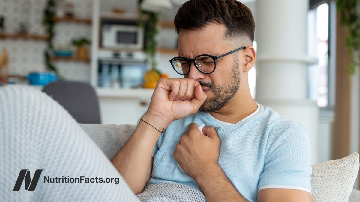 A person on the couch sick with an illness