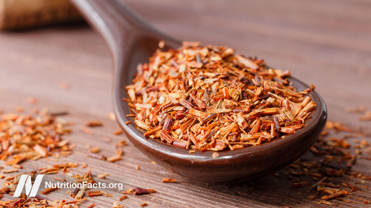 Rooibos tea on a wooden spoon