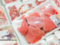 Person shopping for packaged meat