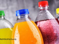 Close up view of various soda bottles