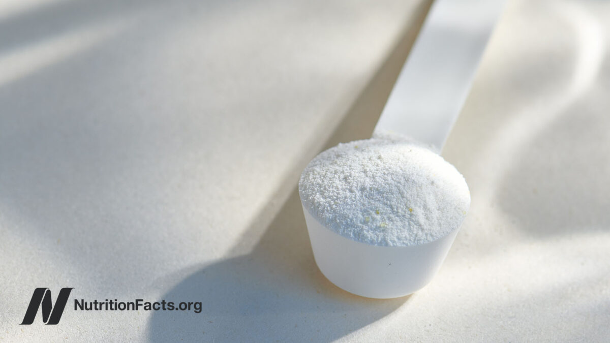 Close up view of a scoop of taurine powder