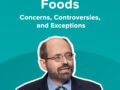 Dr Greger in front of a lecturn
