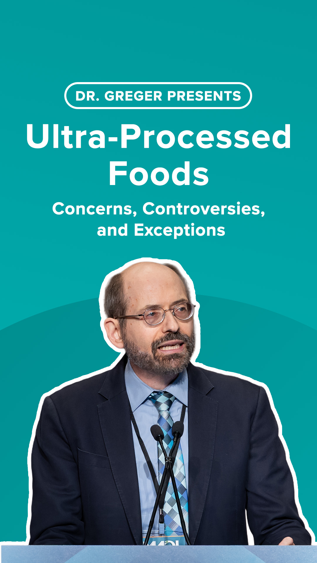 Dr Greger in front of a lecturn