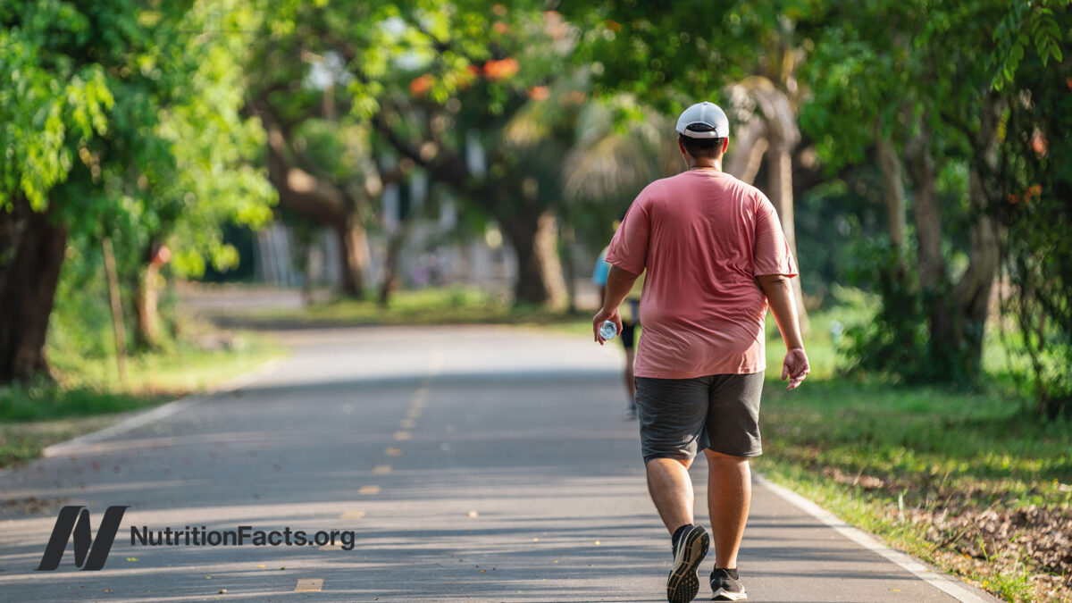 Person walking on an outdoor road for exercise