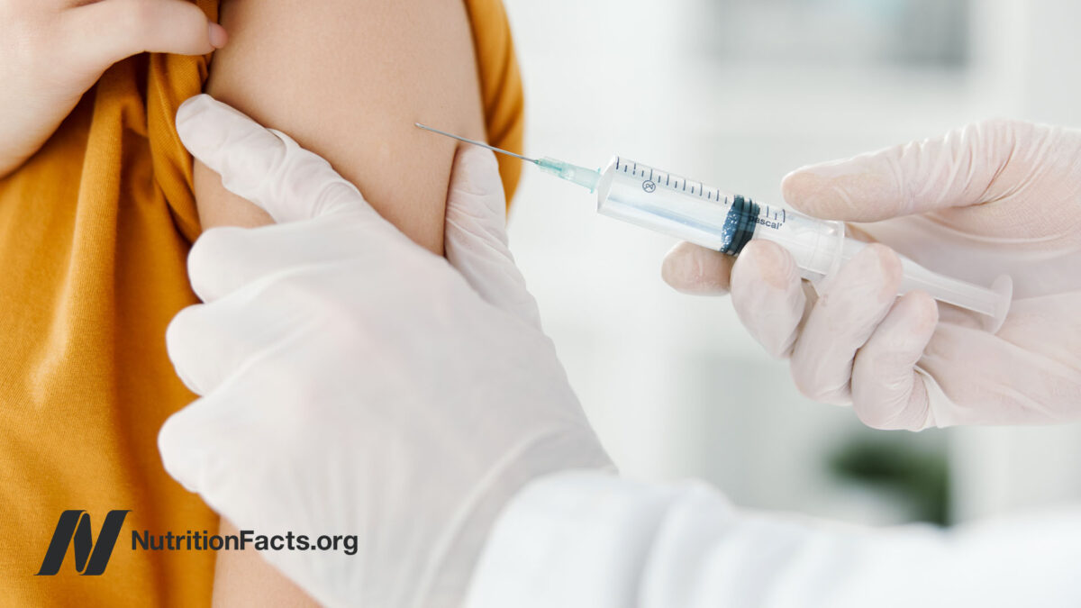 Patient receiving a vaccine in the upper arm