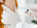 Patient receiving a vaccine in the upper arm